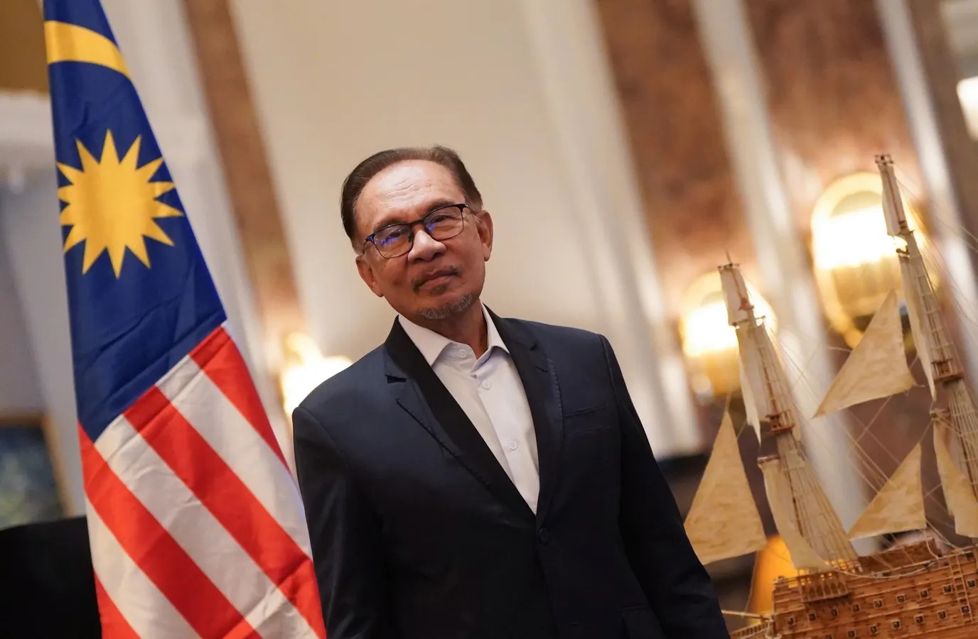 Anwar Ibrahim, Prime Minister of Malaysia, stands in the lobby of the Hotel picture alliance via Getty Images