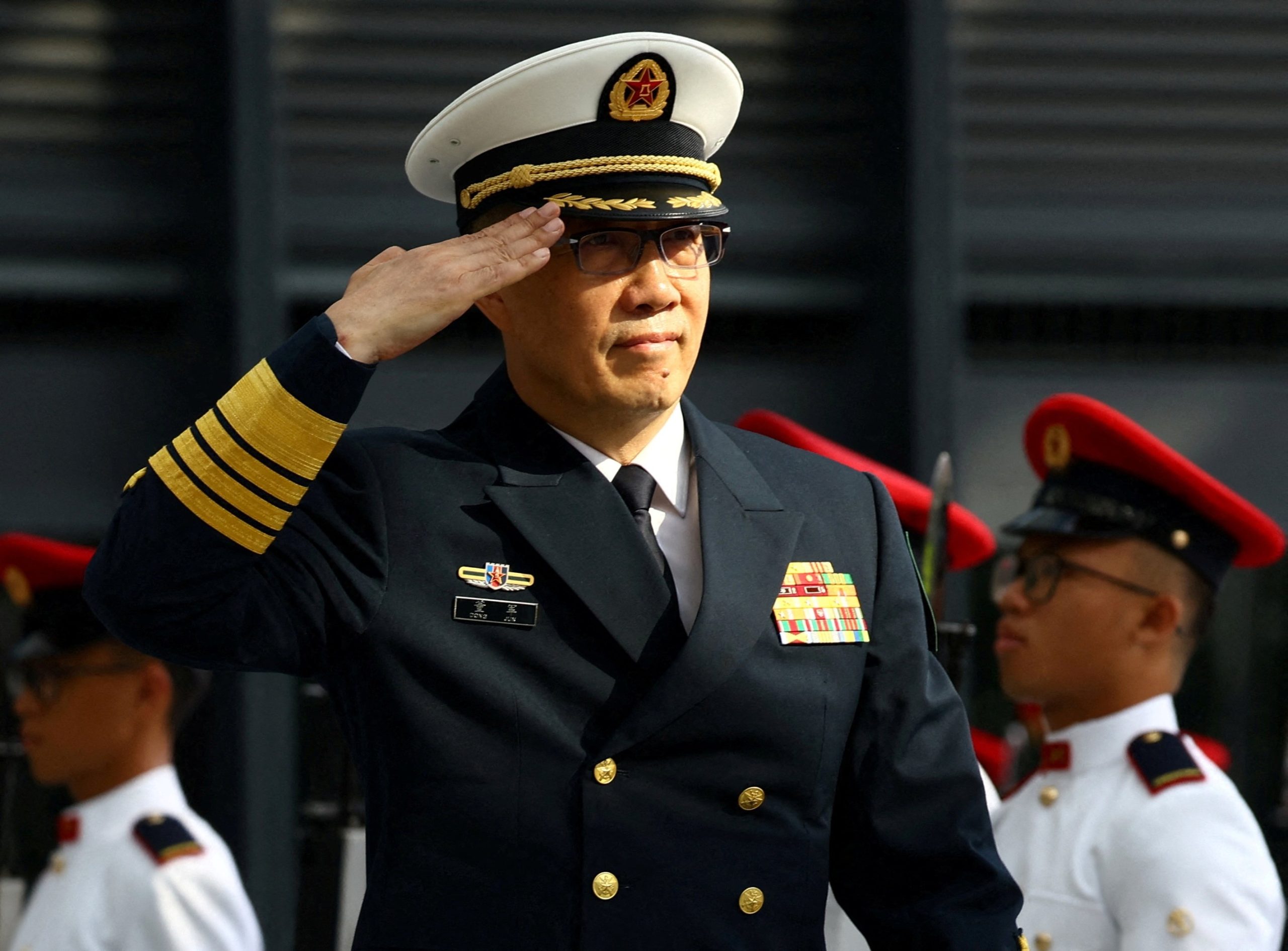 China's Defense Minister Dong Jun inspects honor guards in Singapore, May 30, 2024. (Reuters Photo)